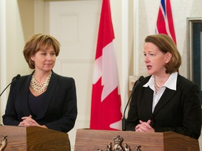 B.C. Premier Christy Clark (L) and Alberta Premier Alison Redford. FILE PHOTO