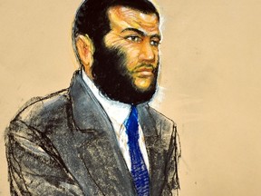 A courtroom sketch shows defendant Omar Khadr listening to testimony during his sentencing hearing at the Guantanamo Bay Naval Base in Cuba, in this sketch from October 26, 2010. (REUTERS/Janet Hamlin/Pool/Files)