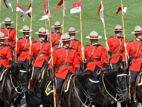 The Mounties' image has taken a beating over stories of sexual harassment of female officers. (JEROME LESSARD/QMI Agency)