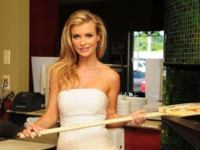 Joanna Krupa unveils her "Be an Angel for Animals" ad campaign for PETA at Sublime Restaurant and Bar in Fort Lauderdale, Florida, April 15, 2012. (Johnny Louis/WENN.com)