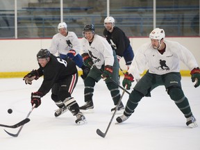 Various NHL players practice in suburban Minneapolis in late September during the lockout. (Marilyn Indahl/QMI Agency)