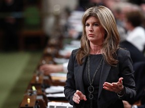 Canada's Public Works Minister Rona Ambrose speaks during Question Period in the House of Commons on Parliament Hill in Ottawa September 20, 2012. (REUTERS/Chris Wattie)