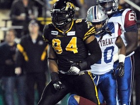 Ticats defensive end Jermaine McElveen sacks Alouettes quarterback Anthony Calvillo during last week’s win. The Tabbies’ defence is looking to mirror its performance against Edmonton. (REUTERS)