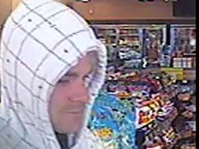 Ottawa police have released this image of a suspect wanted in connection with the armed robbery of a convenience store in the 5000 block on Jeanne d' Arc Boulevard on Tuesday. (Police handout)