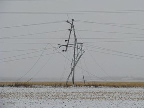 A twisted tower is one example of extreme weather-related damage to Manitoba Hydro equipment in southeast Manitoba after a storm on Thursday, Oct. 4, 2012. Photo taken Friday, Oct. 5, 2012. (Handout)