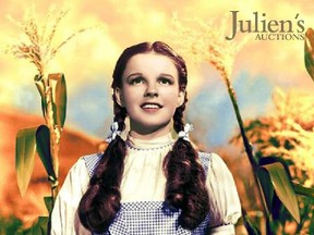 Judy Garland is seen in movie classic "The Wizard of Oz" on the cover of a catalogue from Julien's Auctions received by Reuters October 8, 2012.  The blue-and-white dress which Garland wore throughout the 1939 film will be sold next month at Julien's Auctions in Beverly Hills. REUTER/Julien's Auctions/Handout
