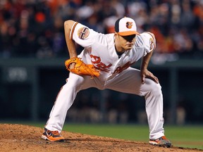 Baltimore Orioles starting pitcher Chen Wei-Yin looks at home plate during the seventh inning against the New York Yankees in Game 2 of their MLB ALDS in Baltimore, Maryland, October 8, 2012. (REUTERS)