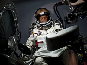 Austrian extreme sportsman Felix Baumgartner goes through dress rehearsal at Red Bull Stratos mission headquarters in Roswell, New Mexico, in this October 6, 2012, handout photo. (Reuters/Red Bull Stratos/JOERG MITTER/Handout)