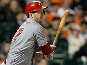 Cincinnati Reds third baseman Scott Rolen hits an RBI single against the San Francisco Giants in the fourth inning of Game 2 in their MLB NLDS playoff baseball series in San Francisco, California October 7, 2012. (REUTERS/Robert Galbraith)