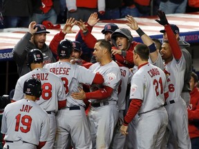 The Cardinals celebrate taking the lead against the Nationals in the ninth inning of Game 5 during their NLDS series at Nationals Park in Washington, D.C., Oct. 12, 2012. (JONATHAN ERNST/Reuters)