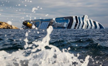 A view of the Costa Concordia cruise ship that ran aground off the west coast of Italy, at Giglio island, January 18, 2012. (REUTERS/ Max Rossi)