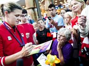 Canadian women’s soccer team captain Christine Sinclair will have time to sign as many autographs as she wants while serving a four-match suspension issued by FIFA last week. (CARMINE MARINELLI/QMI Agency)