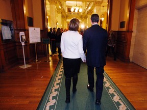 Dalton McGuinty and wife Terri walk to a Queen's Park press conference where he discussed stepping down as premier of Ontario, Monday, Oct. 15, 2012. (Craig Robertson/Toronto Sun)
