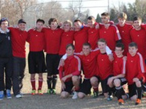 The MacGregor Mustangs celebrate their Rural Provincial Soccer Championship win in Altona last season.
Back row: Keith Lloyd (coach), Dawson Sawatzky (coach -injured and out for the season), Klay Killiam, Connor Nichol, Tyson Murray, Cole Leckie, Carter Willis, Brad Wright, Tyler Hulley, Braden Klippenstein, Trent Boschman, Noah Wieler, Byron Wiebe, Corey May (head coach).
Front row: Evan Wiebe, Brendon Wieler, Campbell Lloyd,   Richard Watson, Brett Garrioch.
Missing from photo (injured in the final game): Reese Anderson. (Submitted photo)