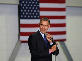 U.S. President Barack Obama speaks during a campaign rally at Cornell College in Mt Vernon, Iowa, October 17, 2012. Obama is campaigning in Iowa and Ohio on Wednesday following the second presidential debate against Mitt Romney on October 16.  REUTERS/Jason Reed