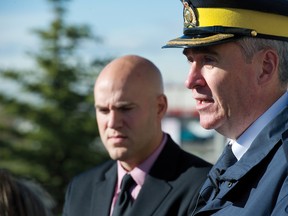 Airdrie, Alta. � Airdrie RCMP Insp. Tony Hamori (right) and Ed Polhil, principal at George McDougall High School, address the media outside the Airdrie RCMP detachment on Oct. 18, 2012 following the arrest of a teacher from the school who has been charged with sexual assault. 
JAMES EMERY/AIRDRIE ECHO/QMI AGENCY