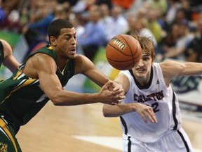 Alberta Golden Bears’ Lyndon Taylor loses the ball after colliding with Carleton Ravens’ Tyson Hinz the last time the two teams met, during the 2012 CIS men’s basketball championship final in Halifax. (Reuters)