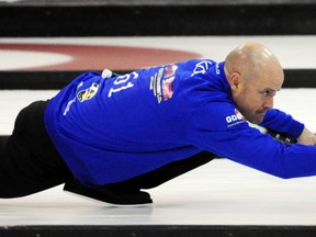 Kevin Koe shoots in a game against Jeff Stoughton on Monday. Koe won 5-3. (Dan Falloon/Portage Daily Graphic)