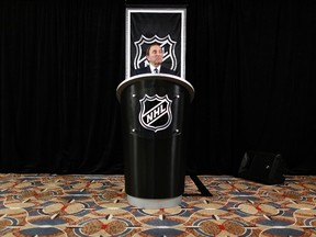 NHL commissioner Gary Bettman speaks to the media in New York last month when public opinion was largely against him. (REUTERS)