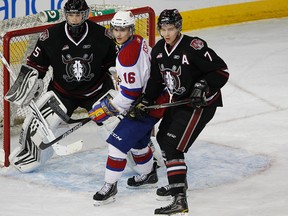 Oil Kings TJ Foster battles for postion with Rebels defensman Alex Petrovic during WHL playoff action at Rexall Place in Edmonton, AB., on Monday, March 28, 2011.  Perry Nelson  Edmonton Sun / QMI Agency