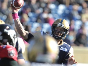 Winnipeg Blue Bombers QB Alex Brink throws against the Calgary Stampeders during CFL action at Canad Inns Stadium on Saturday, Oct. 13, 2012.