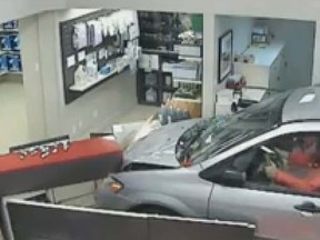 An out-of-control minivan smashed through the front of a store in Quebec City, Monday Oct. 22, 2012.