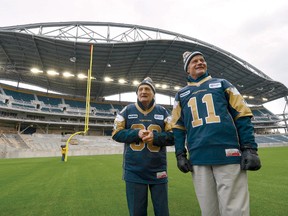 Winnipeg Blue Bombers alumni Sam Fabro (left) and Ken Ploen check out the new Investors Group Field as it nears completion. (FRED GREENSLADE/Reuters)