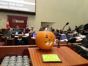 A jack-o-lantern sits in council chamber at Toronto City Hall on Tuesday, Oct. 30, 2012. (DON PEAT/TORONTO SUN)