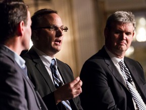 Jeff Westeinde,(left) Jason Flick, and John Jarvis participate in a panel discussion at the inaugural event called "Forecasting Ottawa's Economic Future" hosted by the Ottawa Chamber of Commerce on Wednesday.(Errol McGihon/Ottawa Sun/QMI Agency)