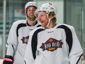 Ottawa Senators goaltender Craig Anderson (left) playing out, and Daniel Alfredsson during an informal skate with fellow NHL players at the Sensplex. November 01,2012 (Errol McGihon/Ottawa Sun/QMI Agency)