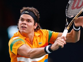 Milos Raonic of Canada lost to unseeded American Sam Querreythe in the third round at the Paris Masters tennis tournament. (REUTERS)