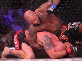 Canadian Ryan (Real Deal) Ford (top) takes to Kyle Baker in a welterweight bout at Casino Rama during Bellator 79 last night. (Peter Turchet/photo)