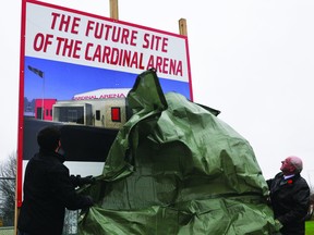 Edwardsburgh/Cardinal township Mayor Bill Sloan, right, unveils a sign marking the future site of the Cardinal arena prior to an official sod turning ceremony for the new recreation facility in this November 2, 2012 file photo.