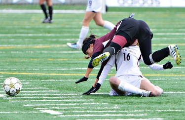Gee-Gees #16 Julia Francki collides with a McMasters player while going for the ball during the OUA Final Four soccer tournament at the Matt Anthony Field in Ottawa, Saturday, November 3, 2012.(Matthew Usherwood/ Ottawa Sun)