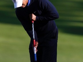 Tiger Woods uses Casey Martin's long putter during a practice round for the 2012 U.S. Open in San Francisco in June. (Matt Sullivan/Reuters/Files)