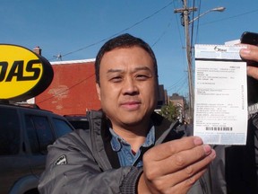 Mike Kang, owner of the Midas shop on Bronson Ave. north of Gladstone Ave., received a parking ticket in 2012 at his business. He said at the time his vehicle was in a parking spot on his own property.
JON WILLING/OTTAWA SUN FILE PHOTO