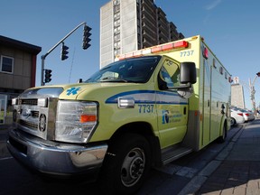 A Gatineau ambulance is seen on a call on St. Joseph Blvd. in Gatineau Thursday, Nov. 8, 2012. Two more calls left before Ottawa paramedics will no longer cross the river to help their Gatineau colleagues. A 50-call cap was put in place this year, to make sure paramedics are available here. Darren Brown/Ottawa Sun/QMI Agency