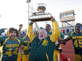 Toronto Mayor Rob Ford celebrates with his Don Bosco football team after they defeated Senator O'Connor to win the finals of the TDCAA senior boys football 26-14 at Easter Shiner Stadium in North York Thursday, Nov. 8, 2012. (MICHAEL PEAKE/TORONTO SUN)