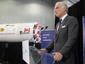 Geoffrey Wilson, president and CEO of Toronto Port Authority, speaks to the media during the announcement of the construction of an underwater tunnel to the island airport in Toronto Nov. 9, 2012. (Dave Abel/Toronto Sun)