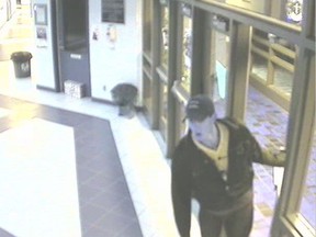 Kingston Police released video and still images of a man for whom they are looking in connection to the theft of a purse at Regiopolis-Notre Dame Catholic High School on Monday.
