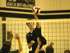 George McDougall Mustangs right side hitter Jordan Wenaas makes one of his eight kills during his team’s 3-0 victory over Springbank in the Rocky View Division sr. boys’ volleyball finals.
