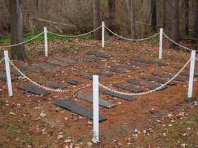 The only evidence remaining of the poorhouse cemetery on the west side of Simcoe are 28 headstones set in cement northeast of the Norfolk County Court House. The stones are located behind a white chain perimeter behind the former location of the original Norview Lodge. (MONTE SONNENBERG Simcoe Reformer )