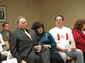 Howard Galganov, his wife and LFA president Chris Cameron listen during South Glengarry's Tuesday council meeting. Galganov brought the same resolution that was passed by South Stormont council and asked if South Glengarry would do the same. Council decided to wait, which didn't make the majority of the dozens of people who showed up for the meeting happy.
Tony Muma staff photo