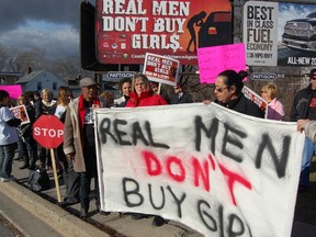 “Real men don't buy girls.” That's what a new billboard, located at the corner of Kathleen and College streets, says in an effort to raise a dialogue about prostitution in Sudbury. (Jonathan Migneault, The Sudbury Star).