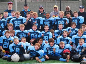 The St. Thomas Hawks celebrate after beating the Laurier Red Storm 8-0 to win the London Minor Football Association atom championship.  (Contributed)