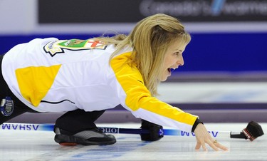 Manitoba skip Jennifer Jones shouts instructions to her teammates during their draw against Prince Edward Island at the Scotties Tournament of Hearts curling championship in Red Deer, Alberta February 19, 2012. REUTERS/Todd Korol  (CANADA - Tags: SPORT CURLING)