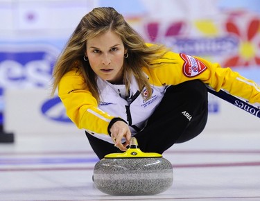 Manitoba skip Jennifer Jones delivers a rock during their draw against British Columbia in the page playoff game at the Scotties Tournament of Hearts curling championship in Red Deer, Alberta February 24, 2012. REUTERS/Todd Korol  (CANADA - Tags: SPORT CURLING)