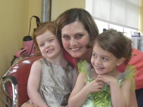 Submitted Photo

Kelley Hoyt hugs daughters Neva (left) and Sawyer.