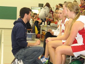 Rothwell-Osnabruck Lancers head coach Stéphane St Denis provides some instruction for his players at the bench on Wednesday, at the Eastern Ontario championship tournament the junior Lancers are hosting. The Lancers have had a two-year powerhouse, with an overall mark of 39-8. TODD HAMBLETON staff photo