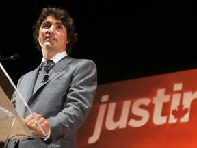 Liberal Member of Parliament Justin Trudeau announces his run for the leadership of the Liberal party at a rally in Montreal, October 2, 2012. REUTERS/Christinne Muschi